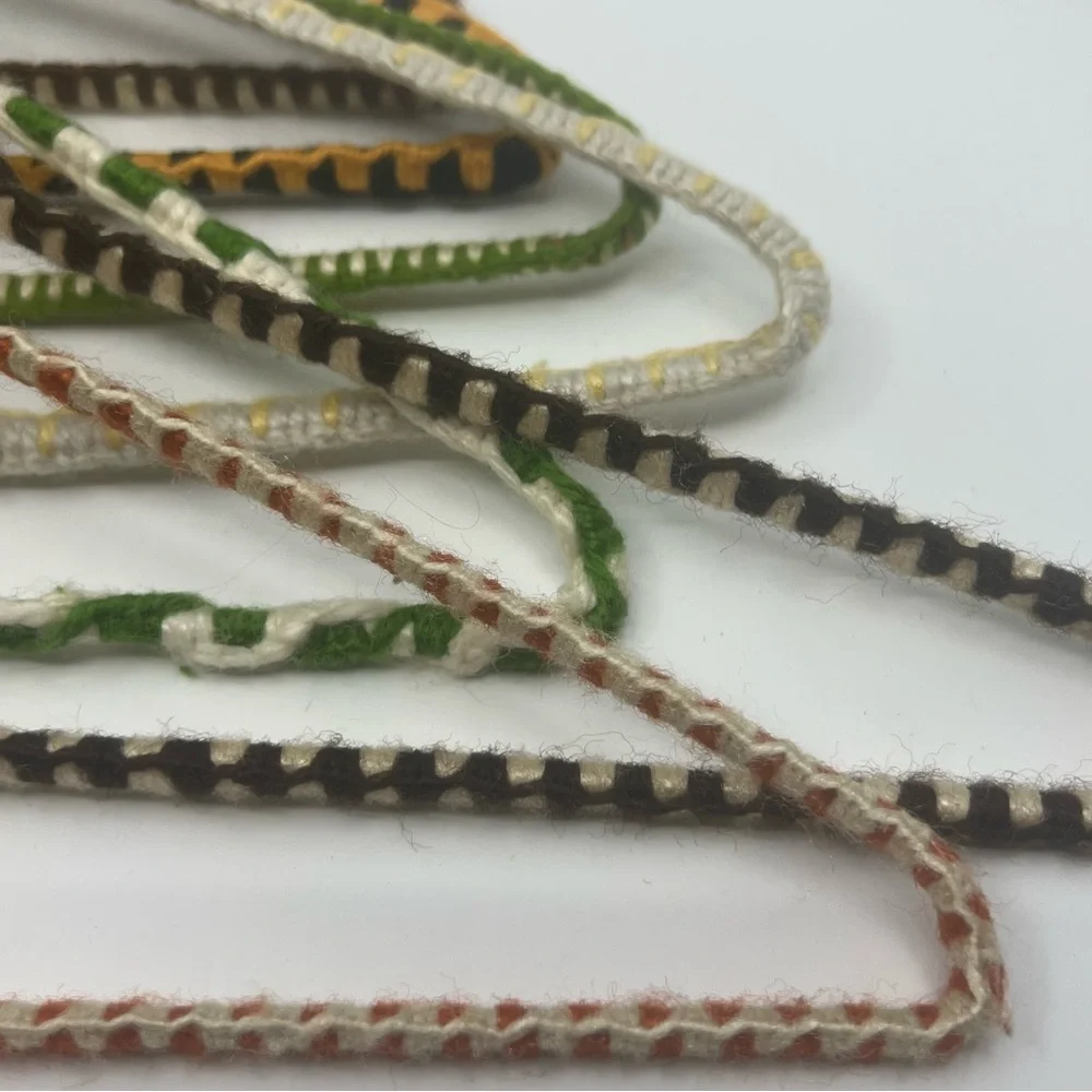 7 vintage wire hangers wrapped in yarn multi color as is